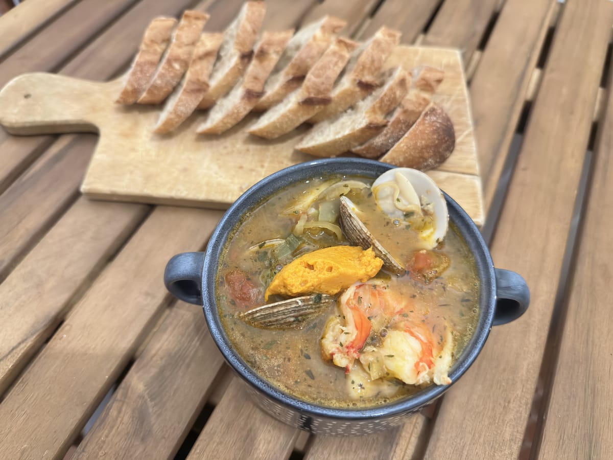 Bouillabaisse served with rouille and baguette